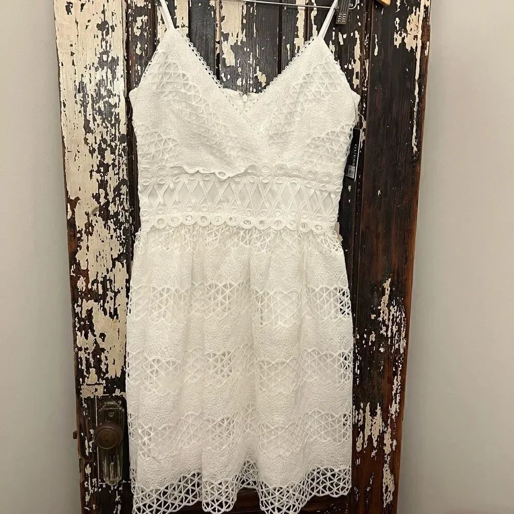 NWT Gorgeous Women’s Guess eyelet spaghetti strap darling white dress. Size 4.